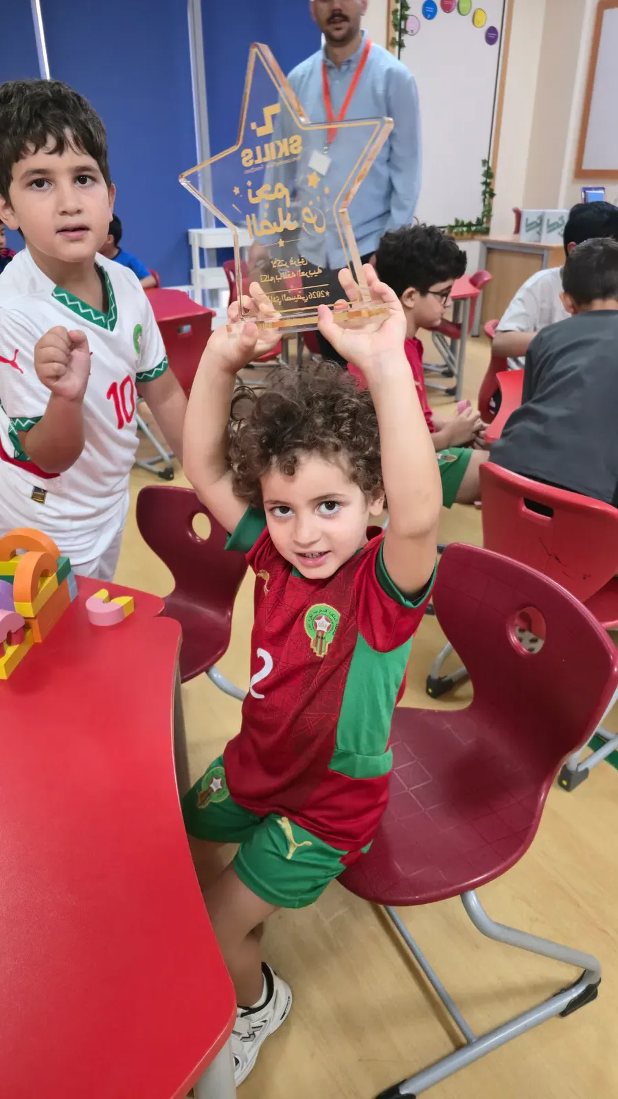 A young ZSkills learner celebrating a sports achievement